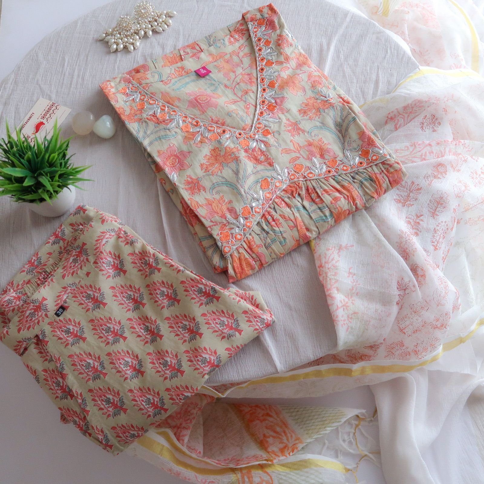 WhatsAppImage2023-05-14at12.16.01PM_2.jpg Orange Floral Cotton Suit Set - Image 1